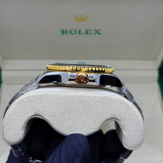 Rolex Submariner Golden rotating dial with master lock